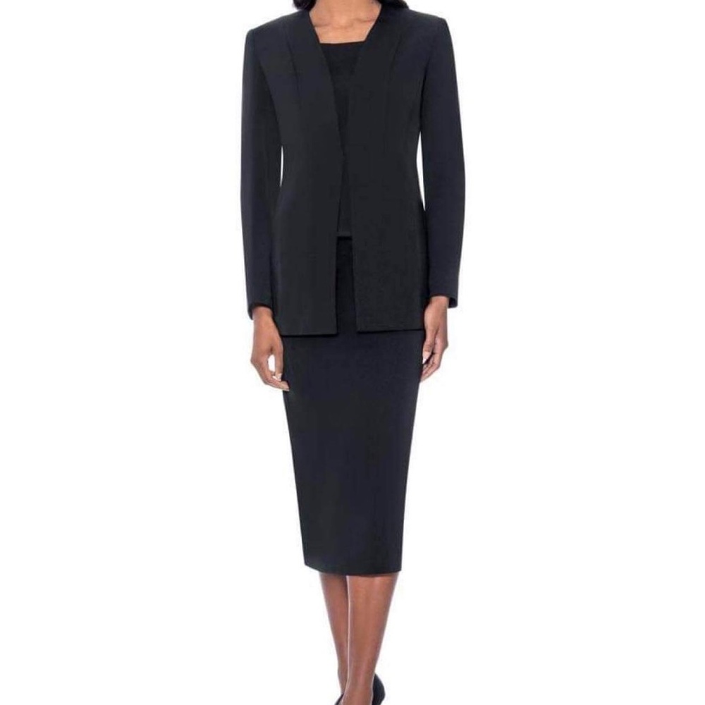 Three piece black suit with white gloves